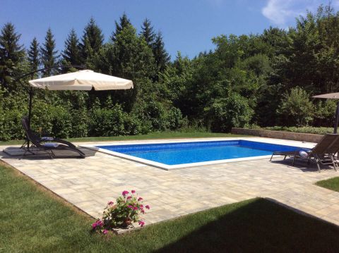 Garden and pool in lush countryside